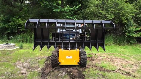 homemade skid steer ripper attachment|bobcat rock picker attachment.